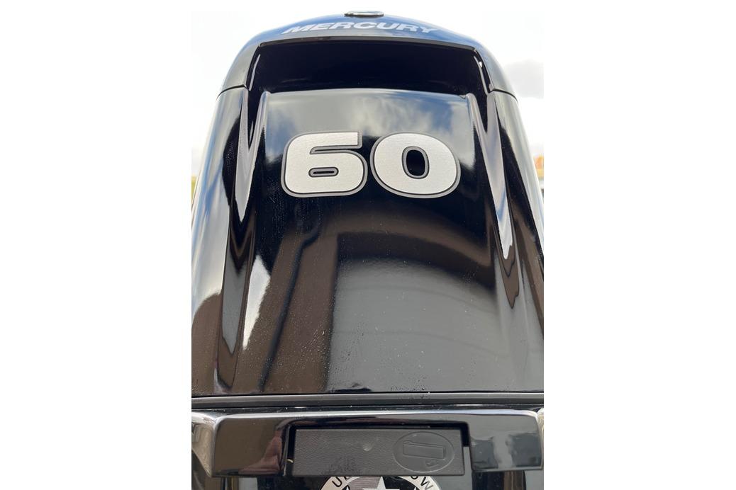 Mercury 60 horsepower outboard motor on 2026 Tracker Grizzly 1754 SC boat.