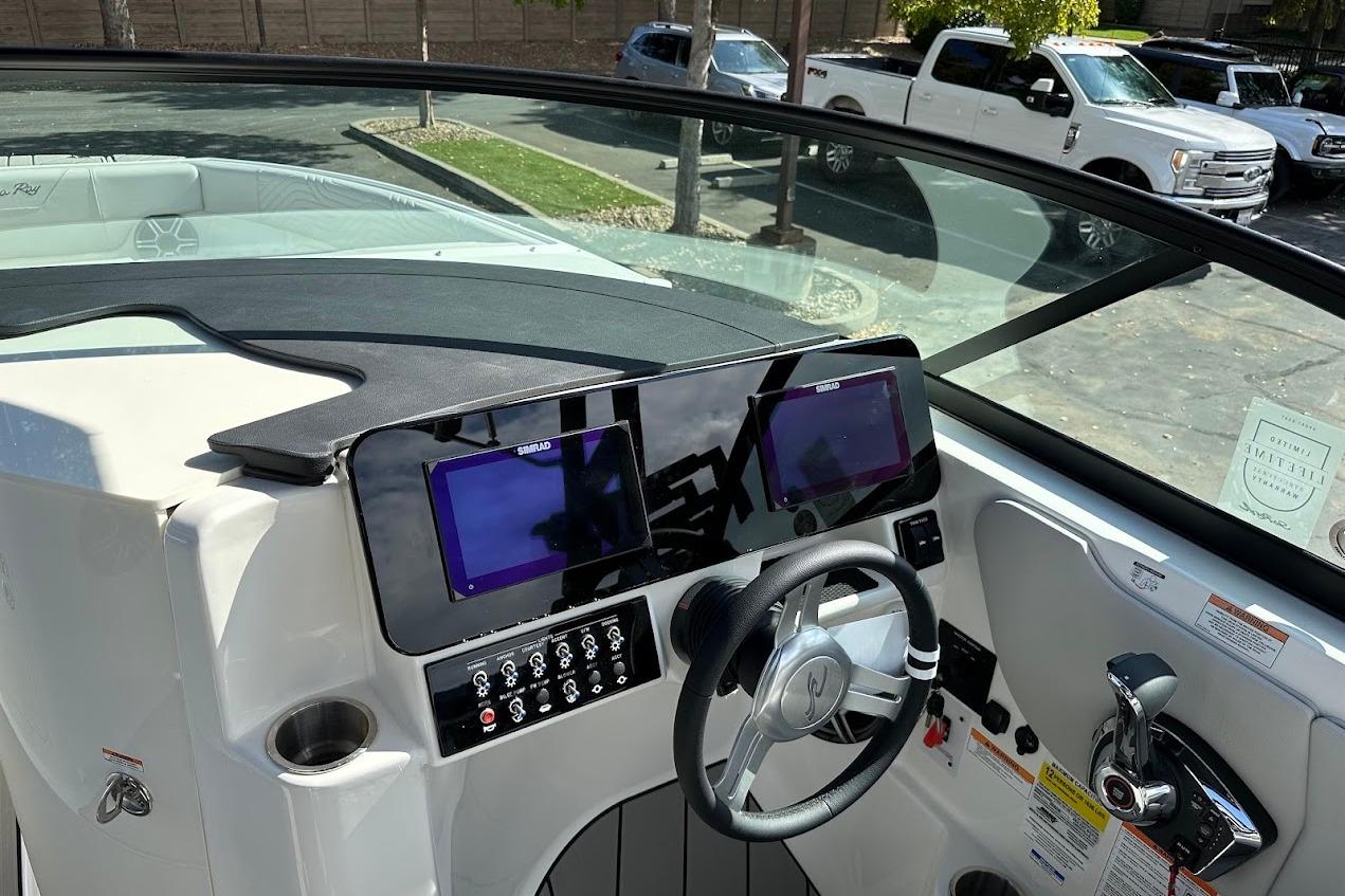2026 Sea Ray SDX 230 Surf boat dashboard with modern controls and dual screens.