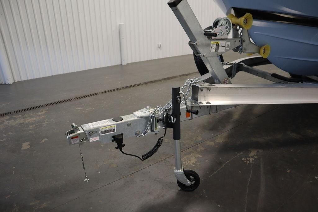 Trailer hitch of 2026 Yamaha Boats 255 FSH Sport E in a garage setting.
