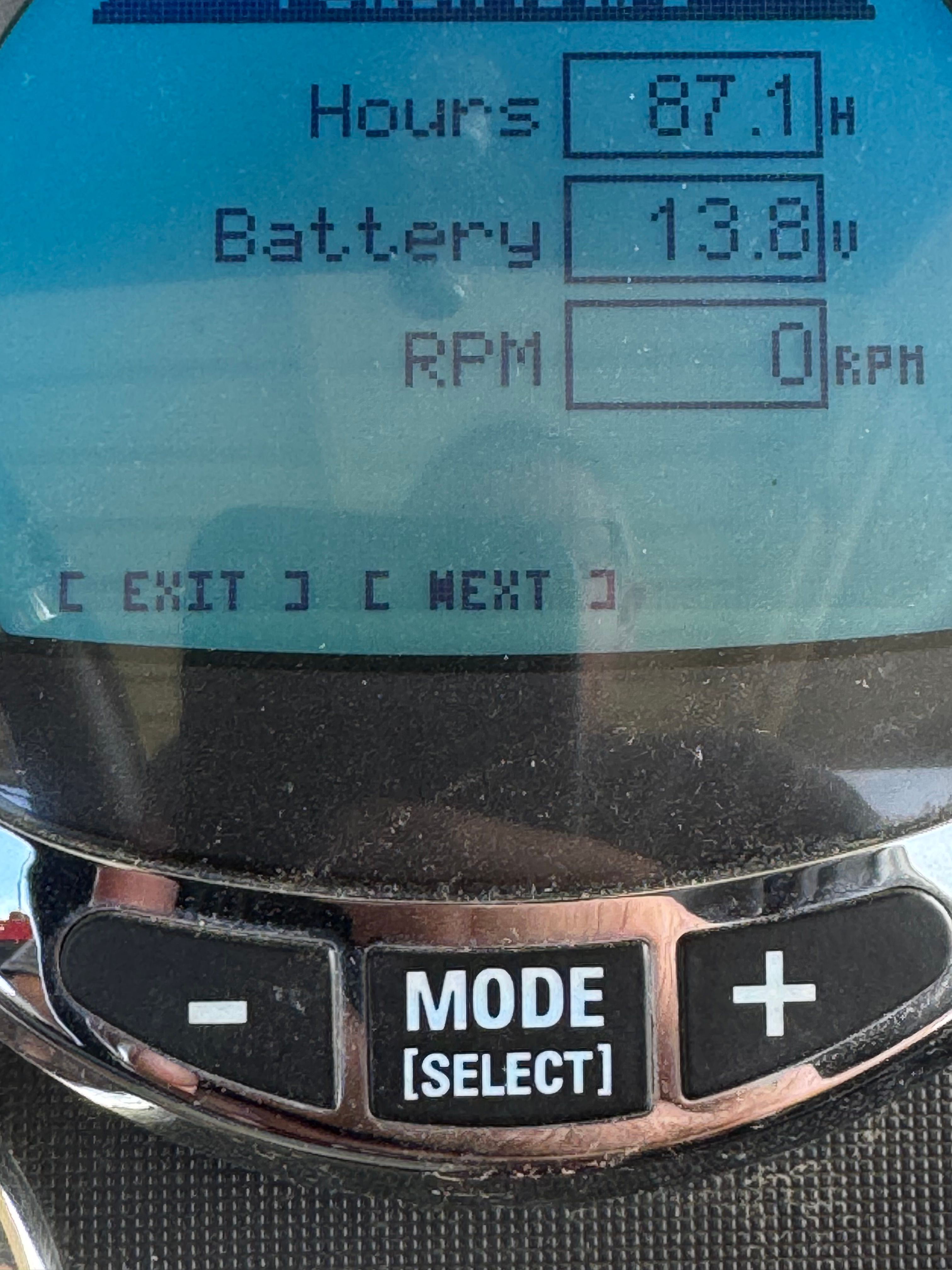 Ranger Z521 Comanche 2015 display showing hours and battery voltage.