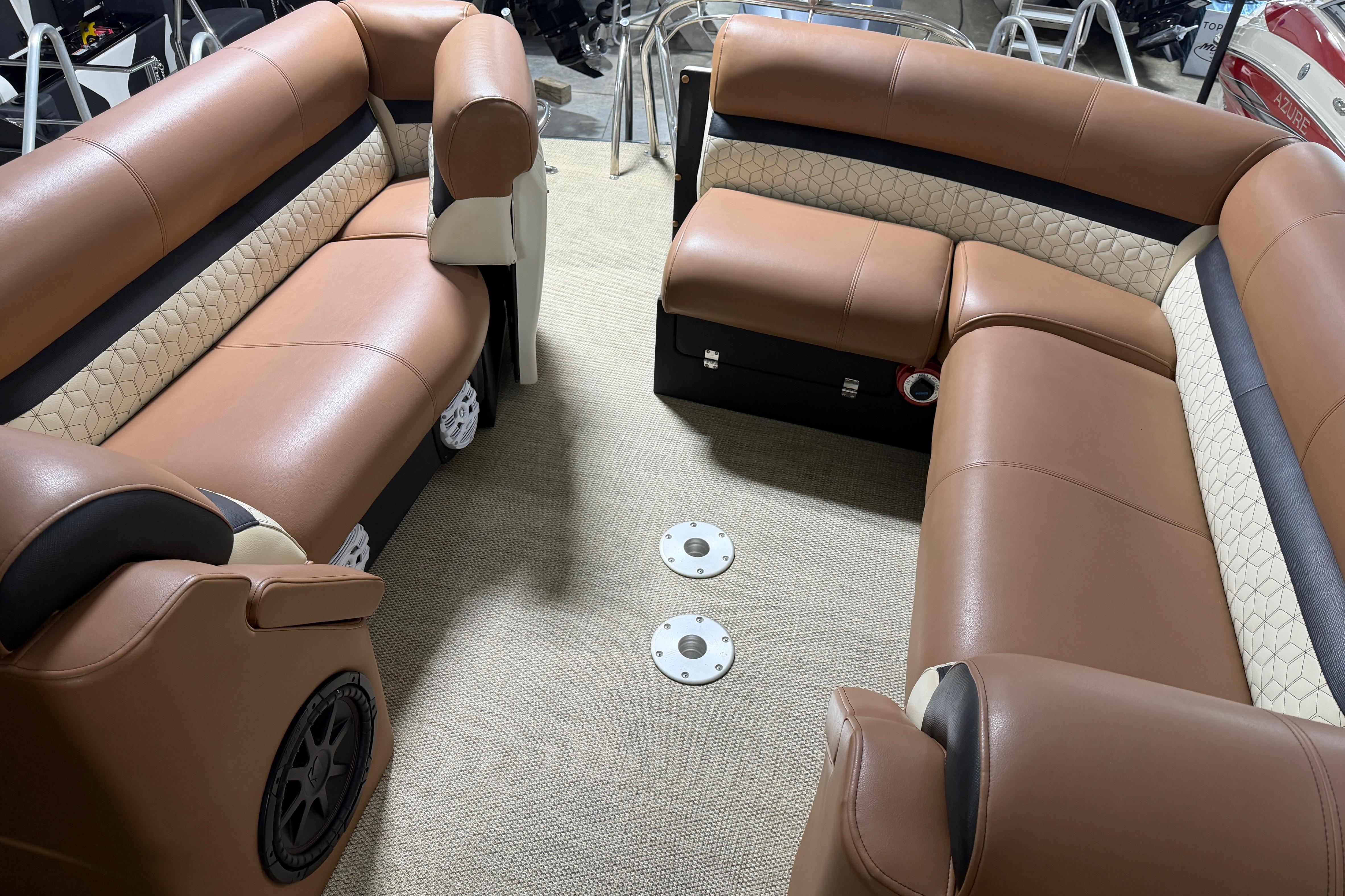 Luxurious interior of 2018 Godfrey Sanpan 2500 ULC pontoon boat with plush seating.