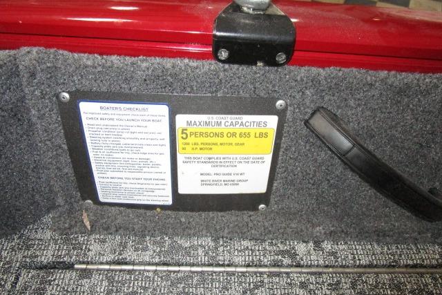 2024 Tracker Pro Guide V-16 WT boat capacity label, indicating a maximum of 5 persons or 655 lbs.