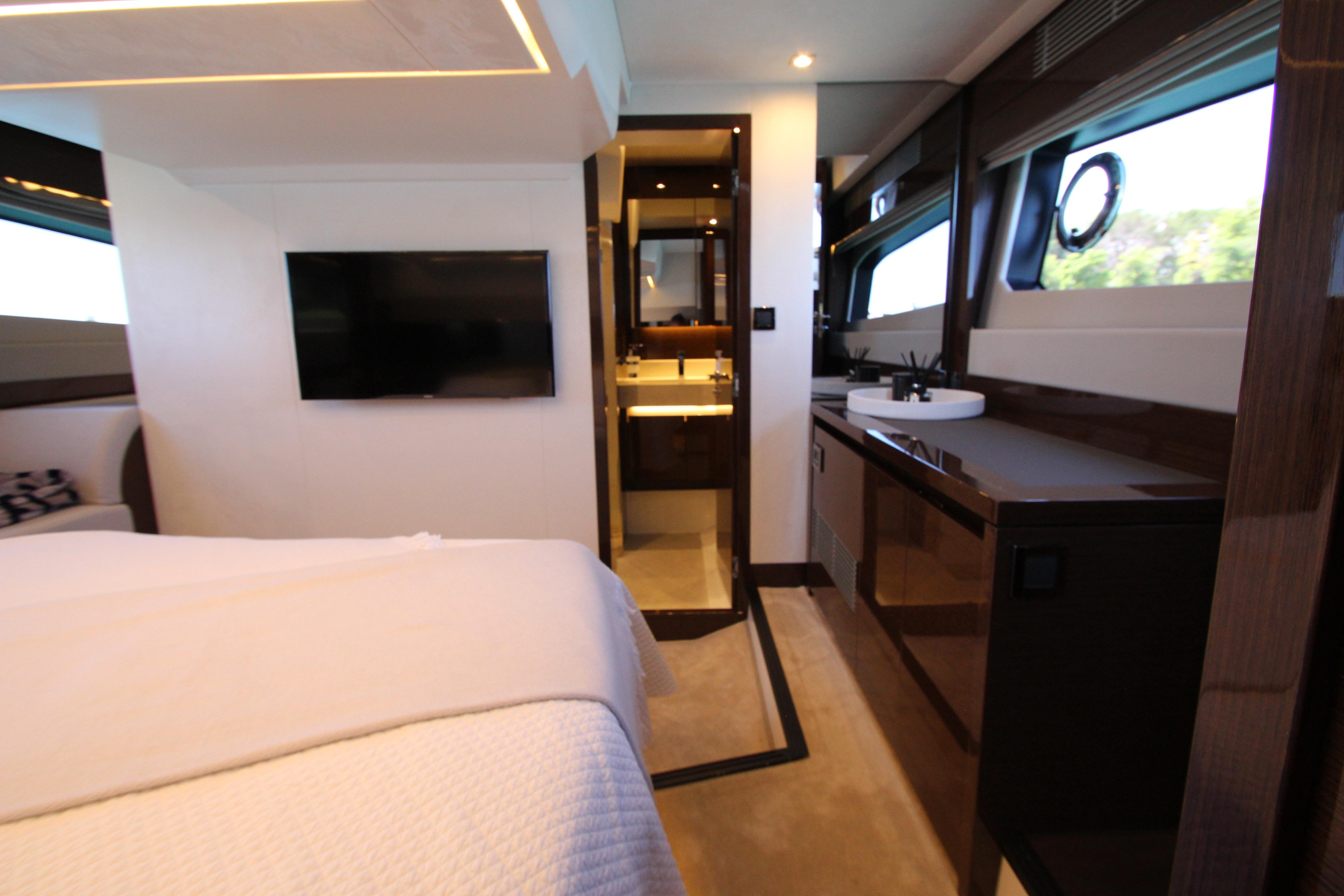 Luxurious interior of 2022 Prestige 520 yacht featuring modern amenities and elegant design.