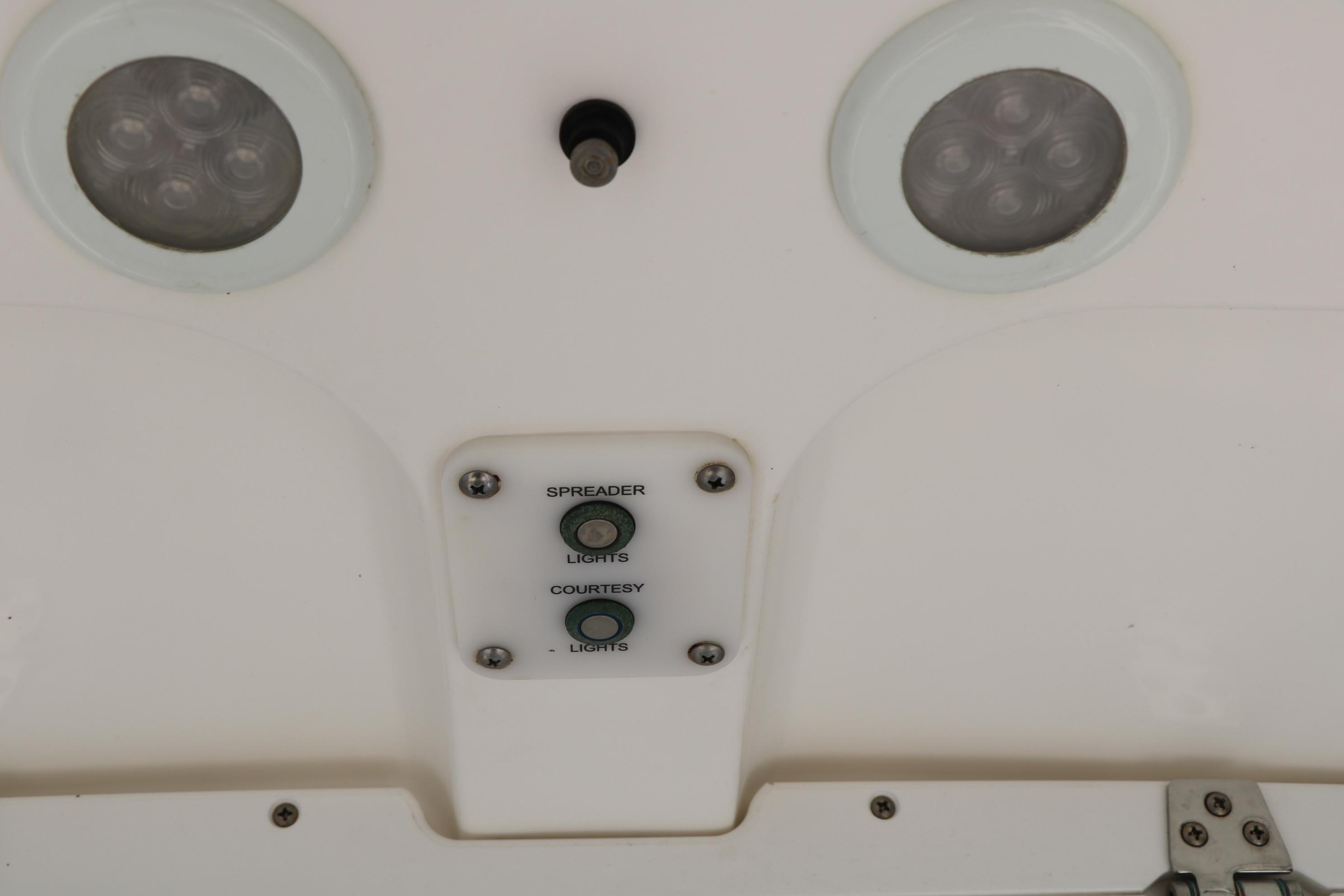 2015 Sea Hunt BX 22 BR boat lighting controls with spreader and courtesy light switches.