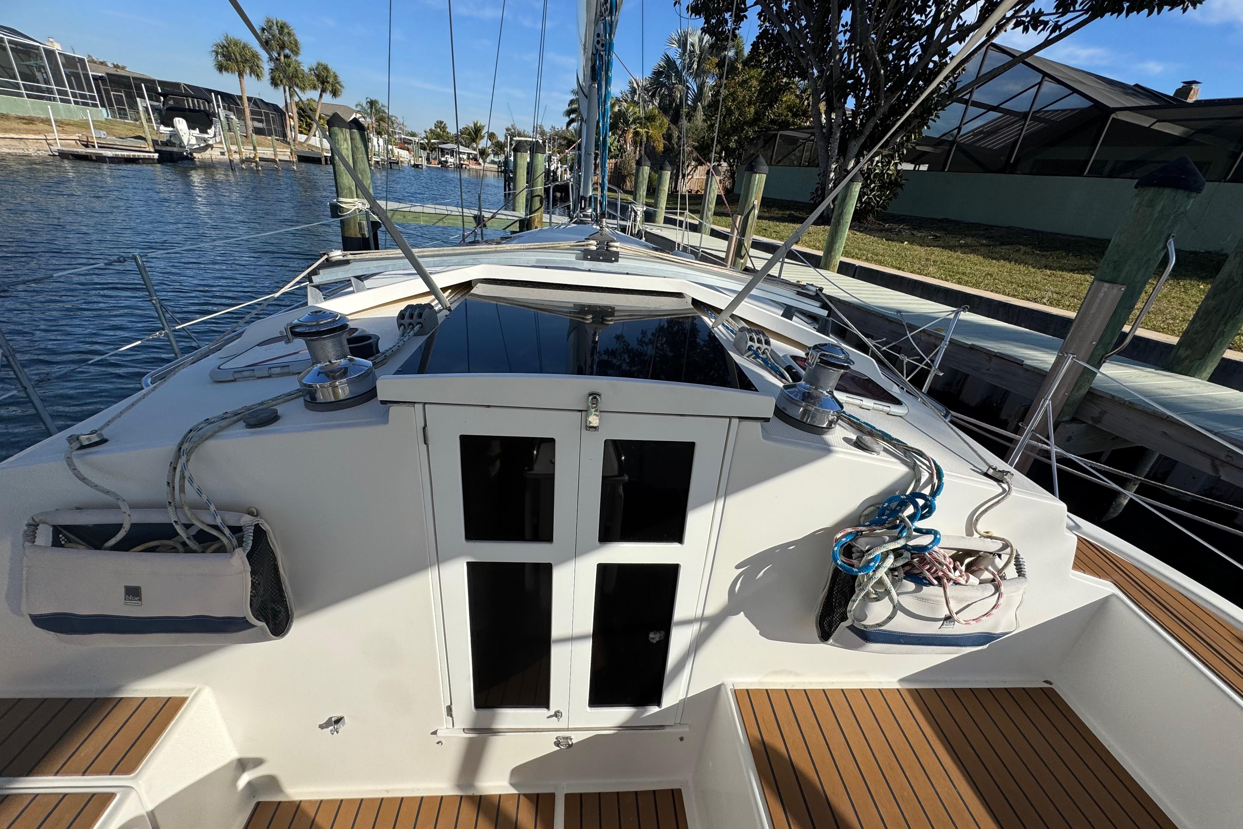 2006 Shannon Shoalsailer sailboat docked, showcasing deck and rigging details.