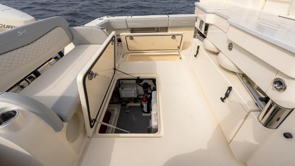 2025 Scout 425 LXF boat interior with open storage compartment, showcasing spacious design and utility.