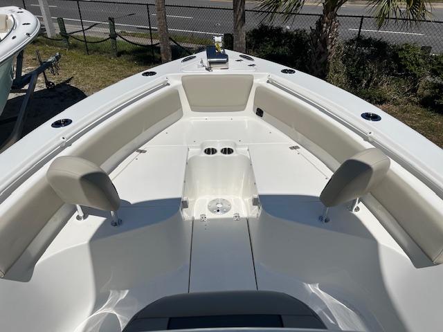 2025 Key West 239 FS boat interior with seating and cup holders.
