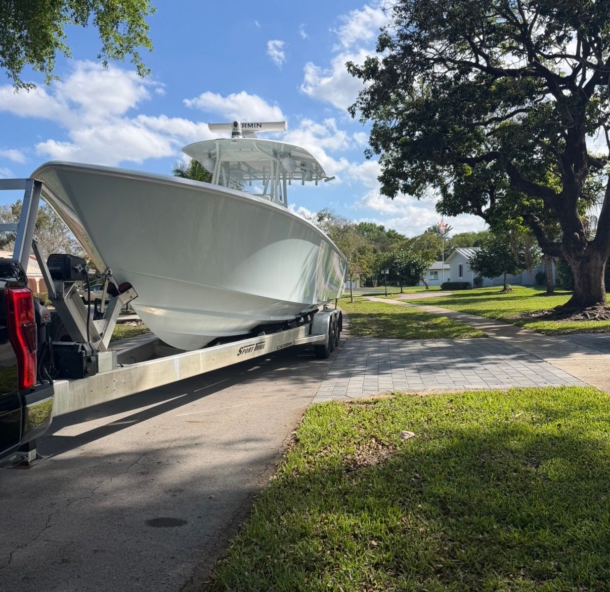 2019 Contender 35 ST boat on trailer outdoors.