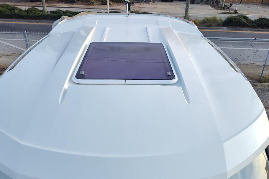 Rooftop view of 2017 Jeanneau Merry Fisher 795 boat with hatch.