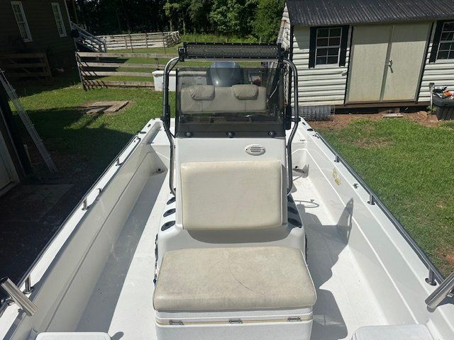 2003 Skeeter ZX2200 boat with seating and console.