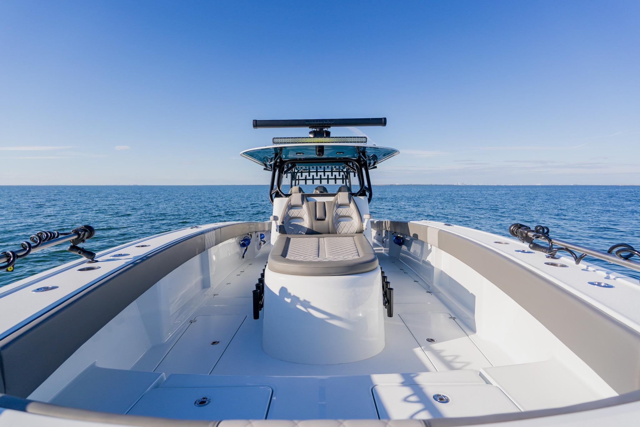 Freeman 42LR 2025 boat on open sea, showcasing sleek design and spacious deck.
