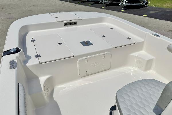 2025 Carolina Skiff 21 LS boat interior with storage compartments and seating.