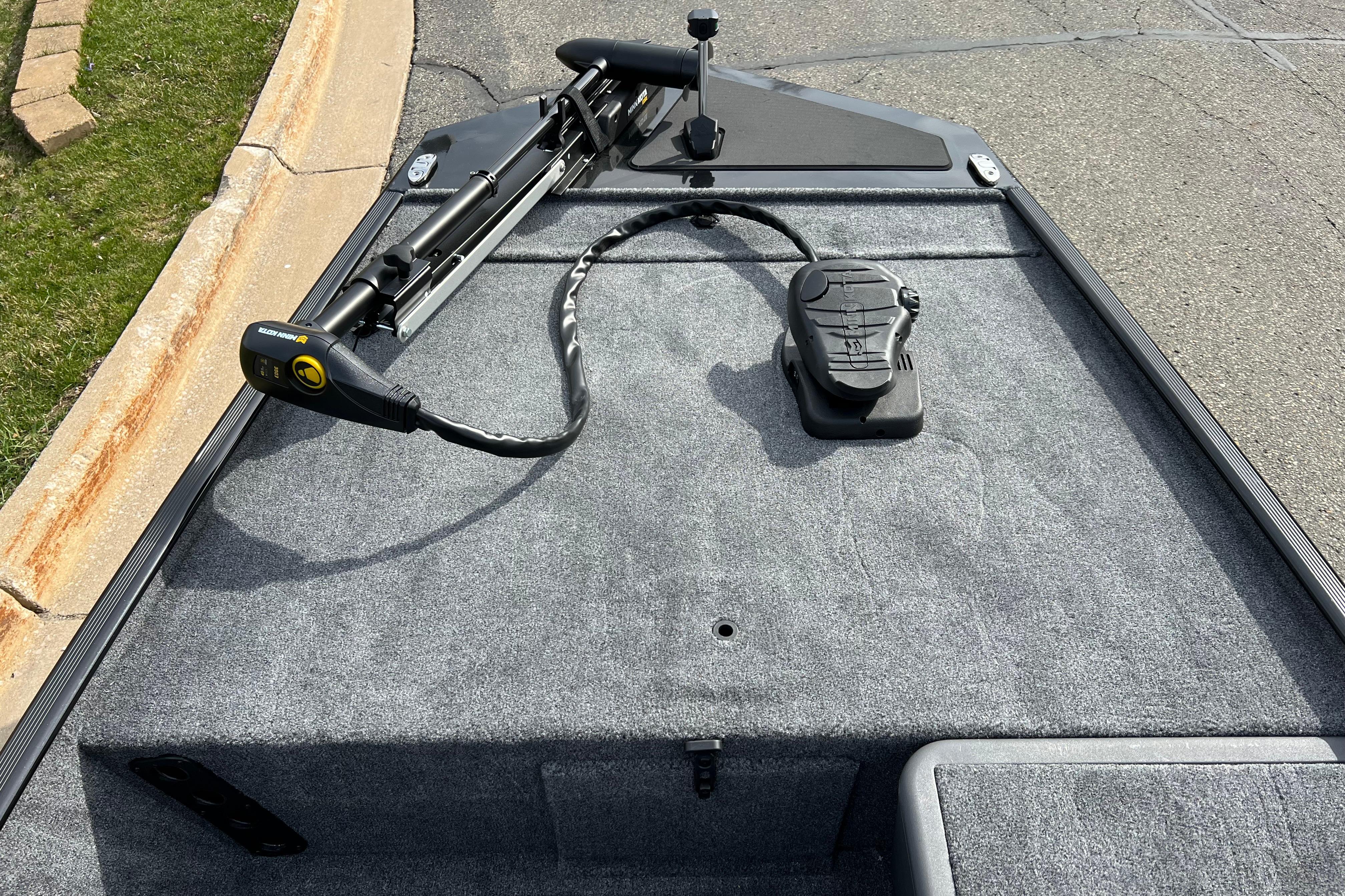 2026 Tracker Bass Tracker Classic XL boat deck with trolling motor and foot pedal.
