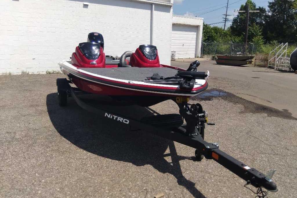Red 2026 Nitro Z17 boat on trailer in outdoor setting.