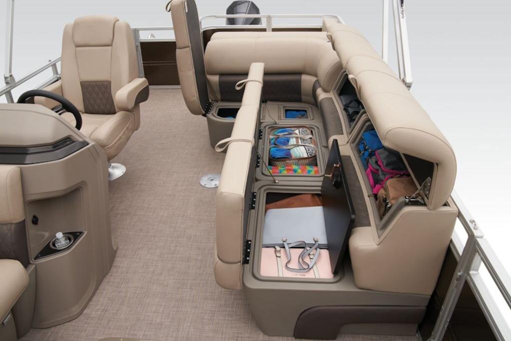 2025 Sun Tracker Sportfish™ 24 XP3 interior with storage compartments open.