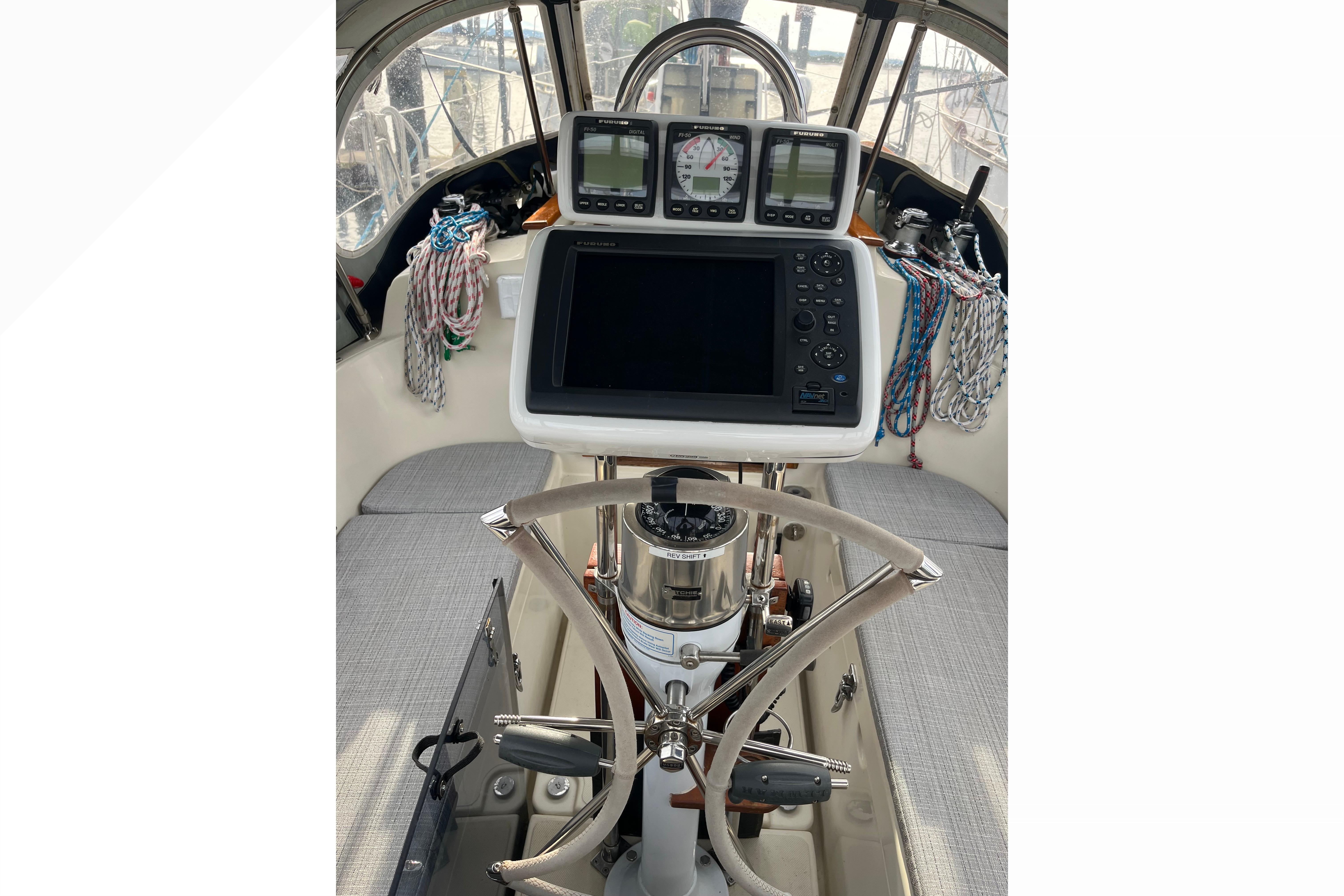 Cockpit of 1997 Pacific Seacraft Crealock 34 sailboat with navigation instruments.