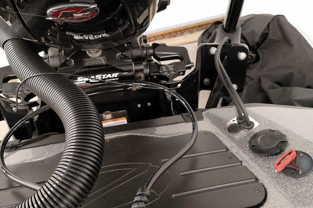 2026 Ranger Z519R Cup-Equipped boat engine and control panel close-up.