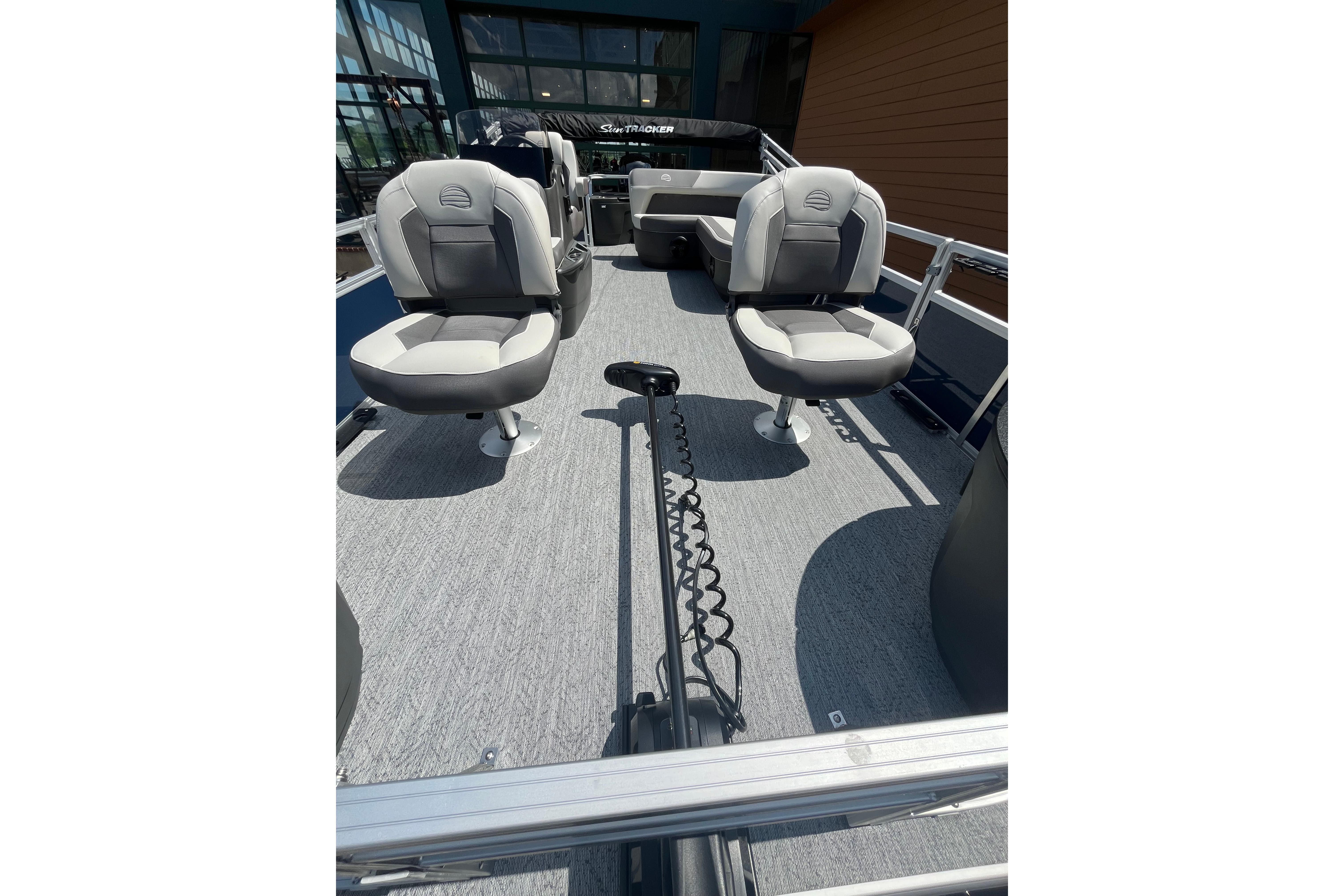 2026 Sun Tracker Bass Buggy 18 DLX interior with two swivel seats on deck.