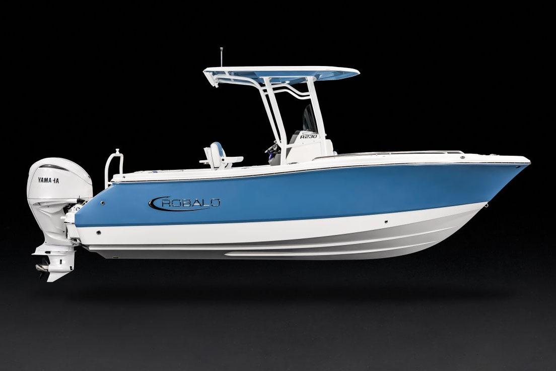 Manufacturer Provided Image: 2026 Robalo R230 Center Console boat with Yamaha engine, blue and white design.