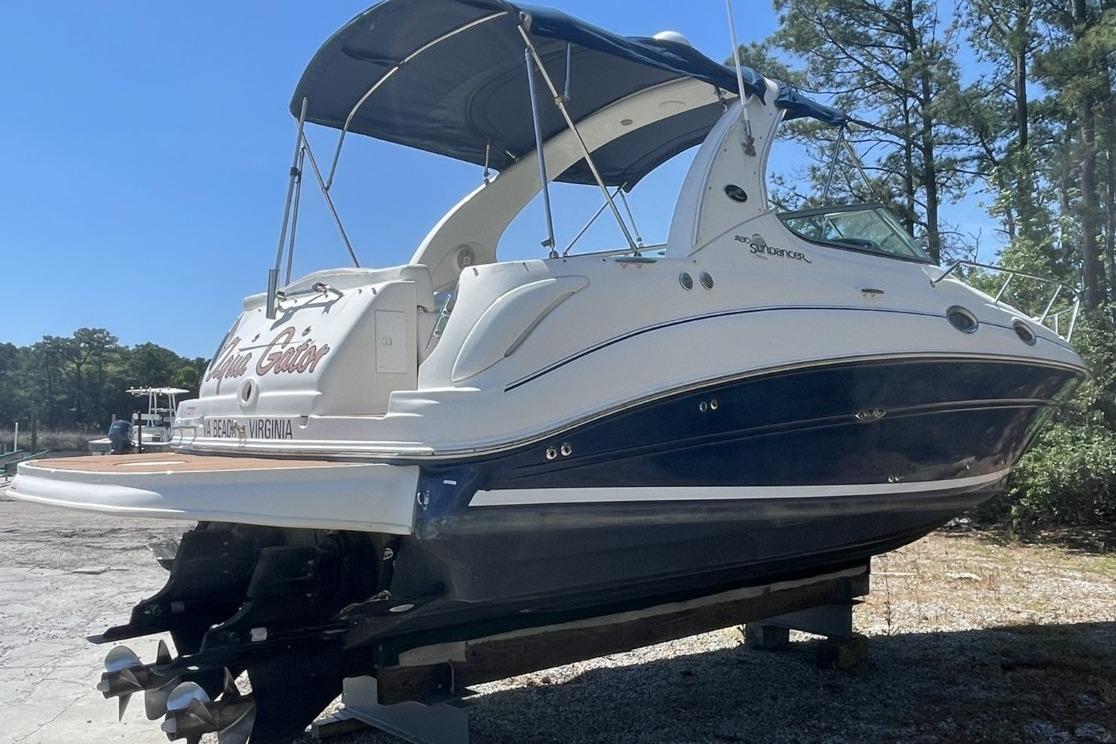 2008 Sea Ray Sundancer 280 boat on dry dock, featuring sleek design and blue hull.