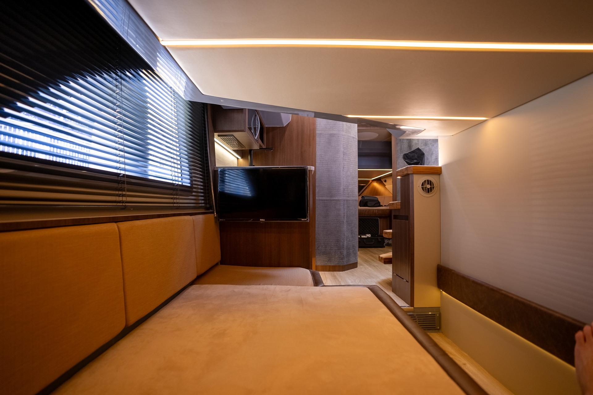 Luxurious interior of 2026 Hanover 447 RV with modern amenities and cozy seating.