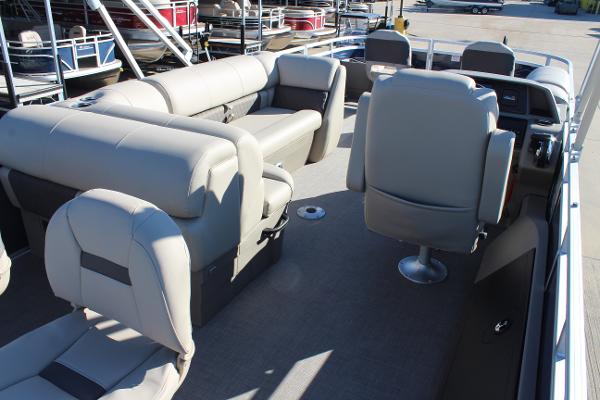 2025 Sun Tracker Fishin' Barge 22 DLX interior with comfortable seating and spacious layout.