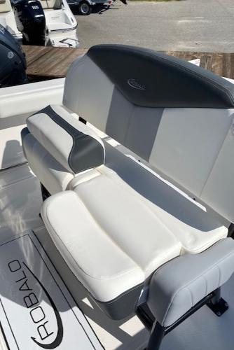 2024 Robalo R222 Center Console boat seating area with white and gray upholstery.