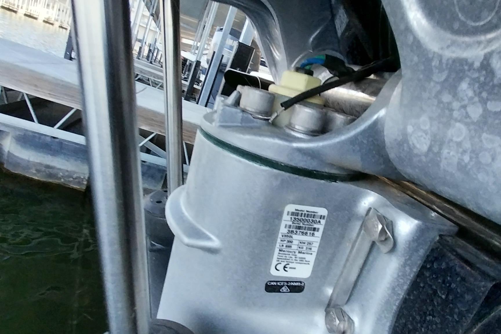 Close-up of a 2023 Ranger 2500LS boat motor component at a dock.