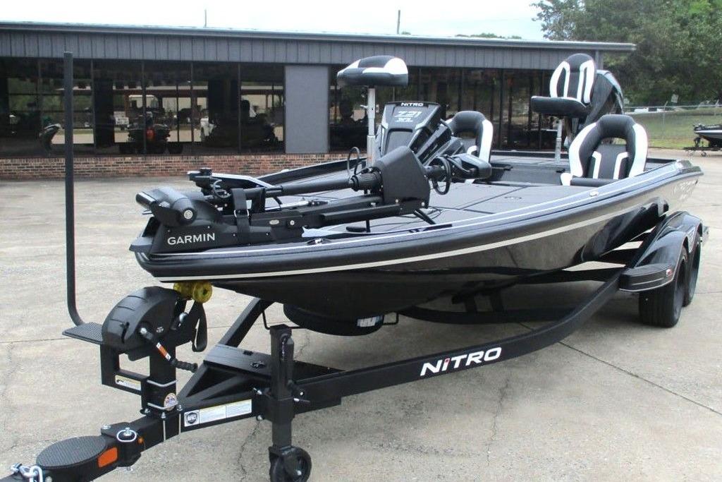 2026 Tracker Pro Guide V-16 WT boat on trailer, featuring Garmin equipment.