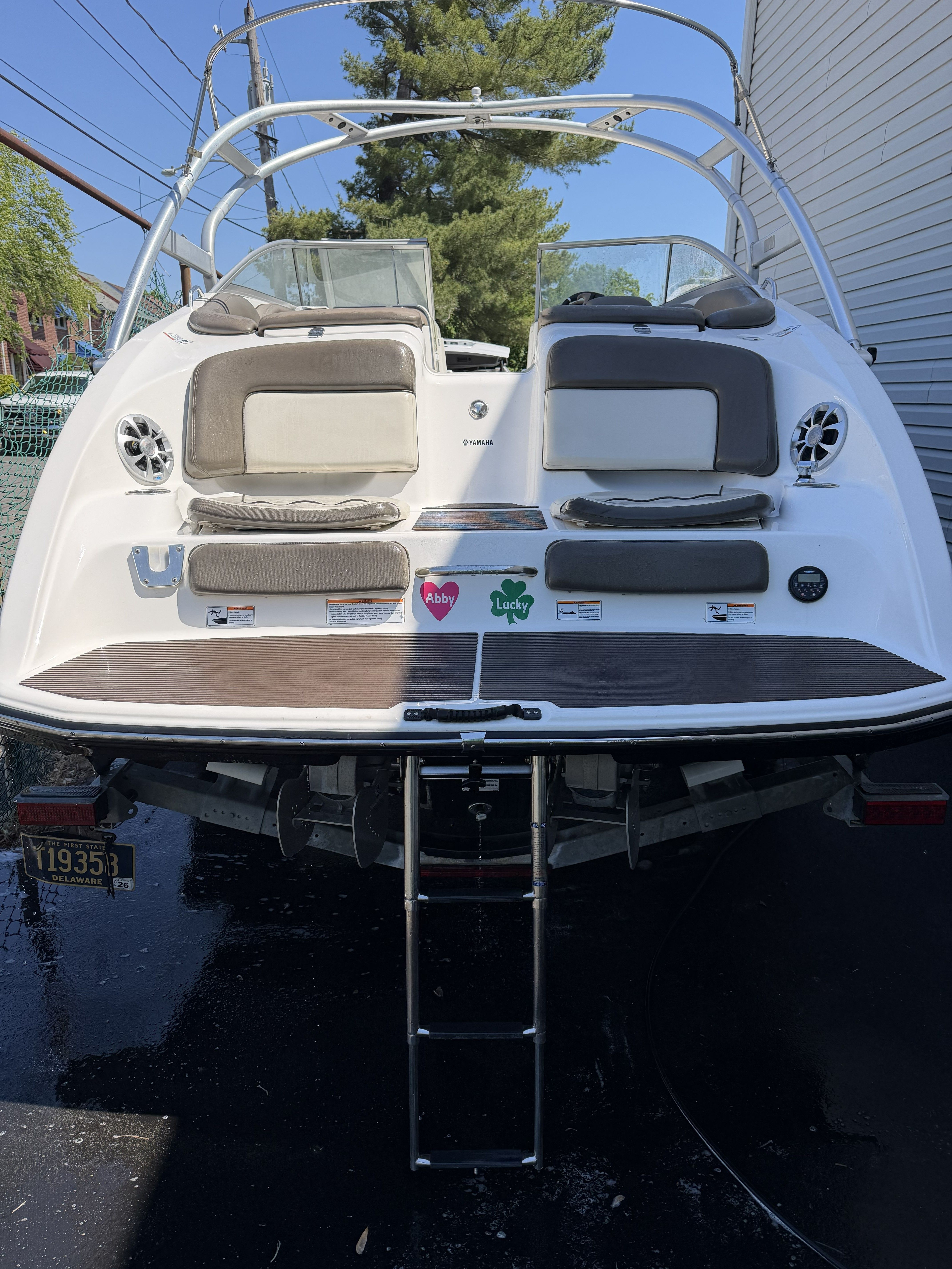 Rear view of a 2012 Yamaha Boats 242 with swim platform.