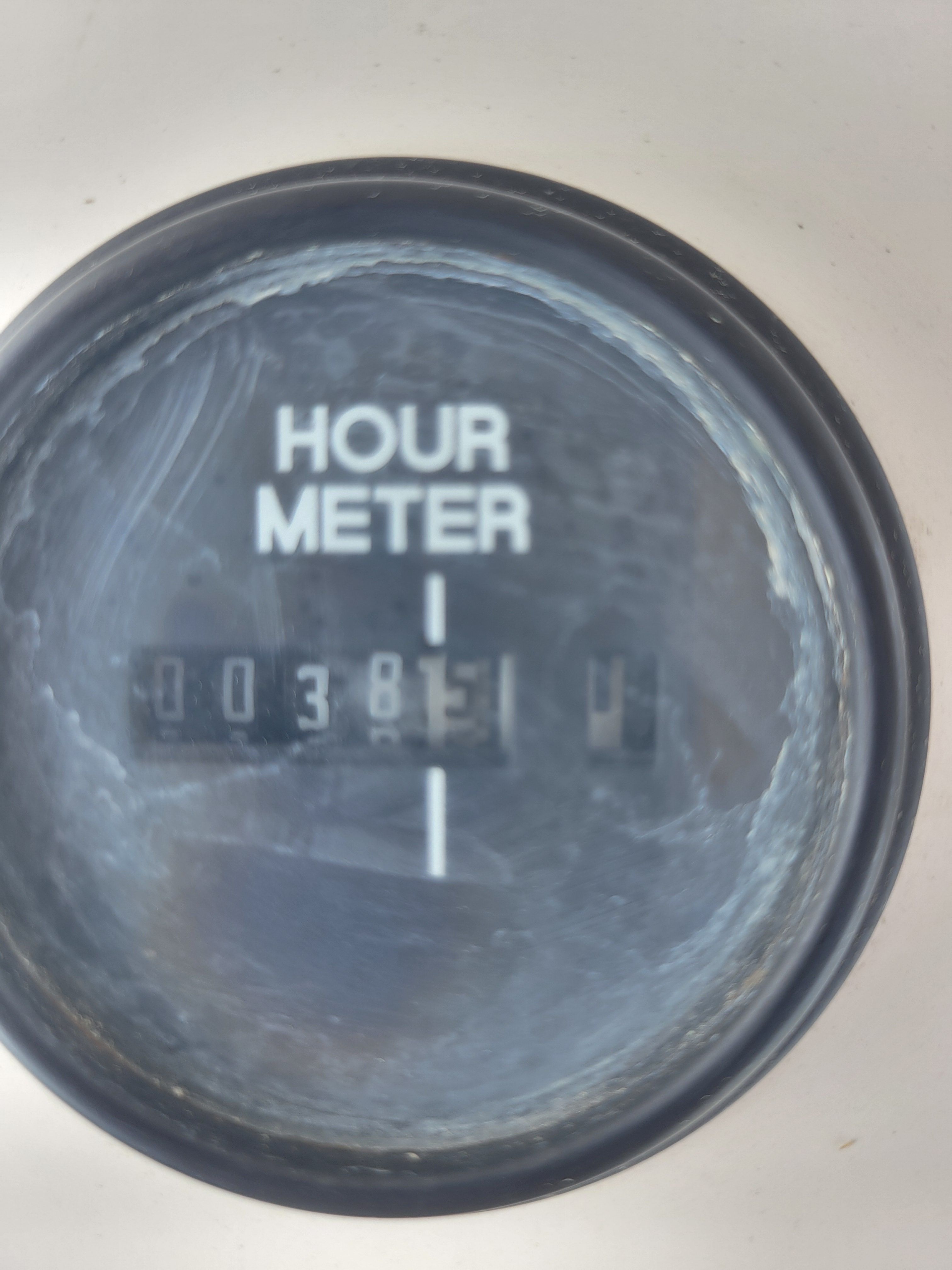 An hour meter displays 385 hours.