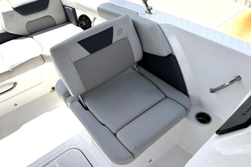 2026 Hurricane SunDeck Sport 2050 OB boat interior with gray seating and cup holder.
