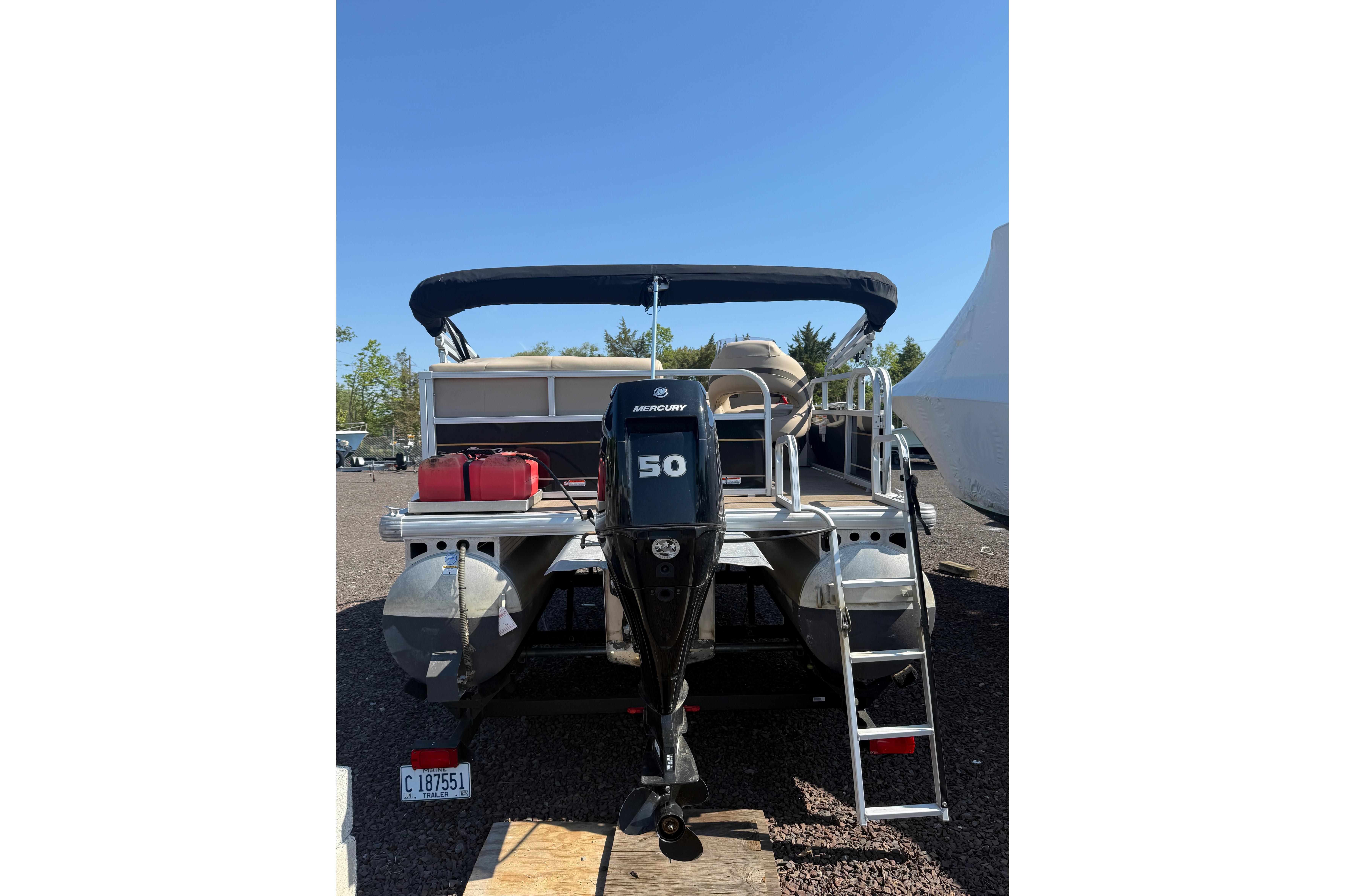 2021 Sun Tracker Bass Buggy 16 XL Select pontoon boat with Mercury 50 engine.