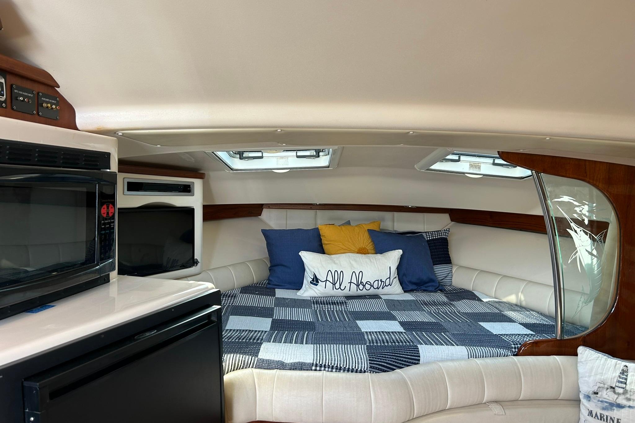 Interior of 2007 Grady-White Express 360 boat with cozy bed and modern amenities.