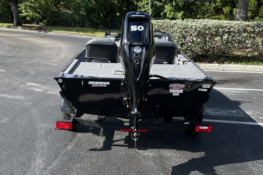 2026 Tracker Bass Tracker Classic XL boat with Mercury 50 engine, parked outdoors.