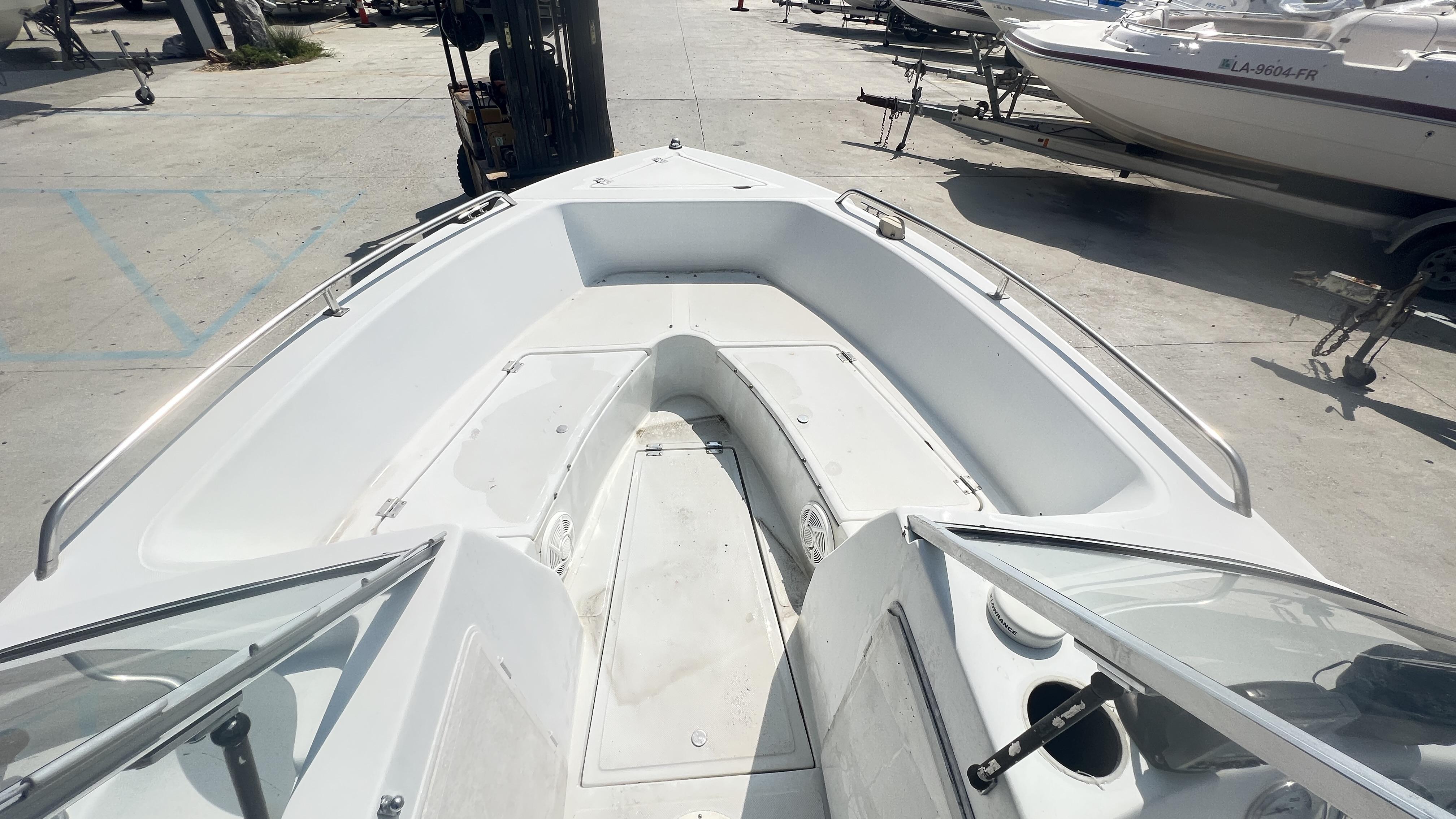 1998 Pro Sports Walk Through boat interior with open deck and seating area.