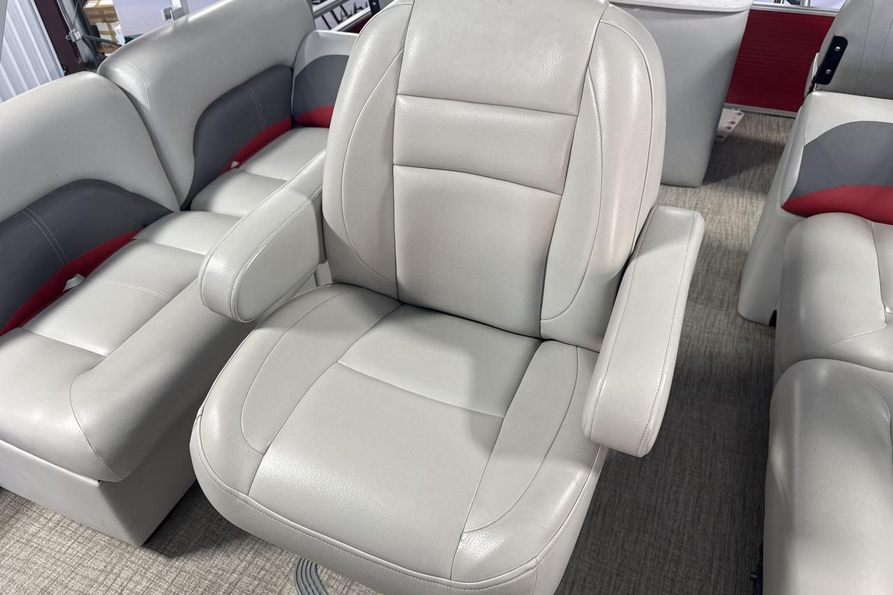 2022 Landau ALURE 232 boat interior with plush beige seating and armrests.