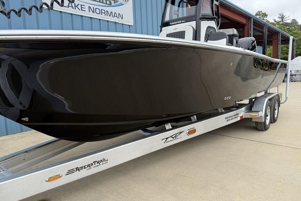2026 Tidewater 2500 Carolina Bay boat on trailer, displayed outdoors.