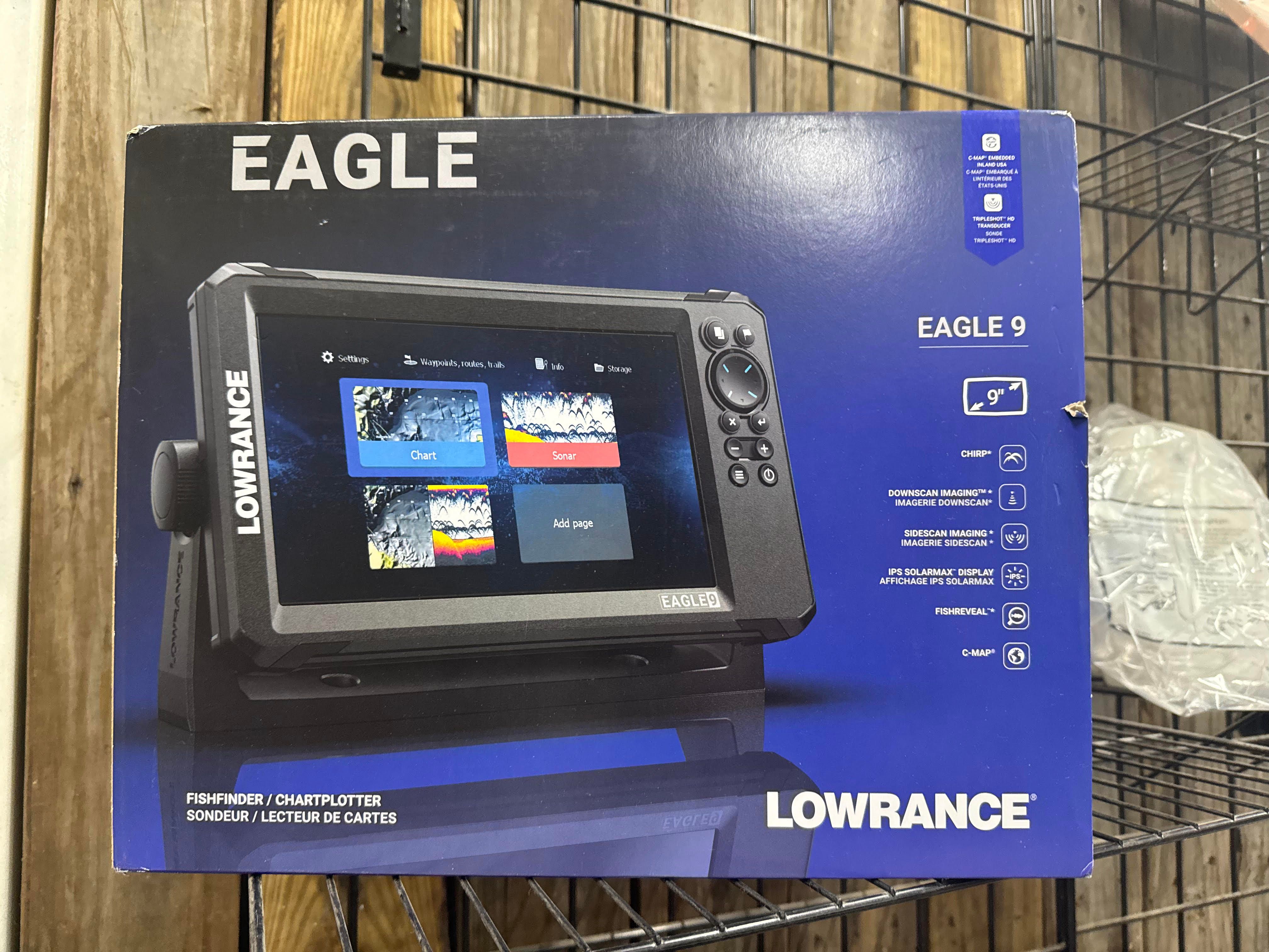Lowrance Eagle 9 fishfinder on a shelf.
