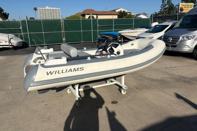 2018 Williams 345 Sports Jet boat on a trailer in a parking lot.