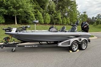 2026 Ranger Z519R Cup-Equipped boat on trailer, parked outdoors.