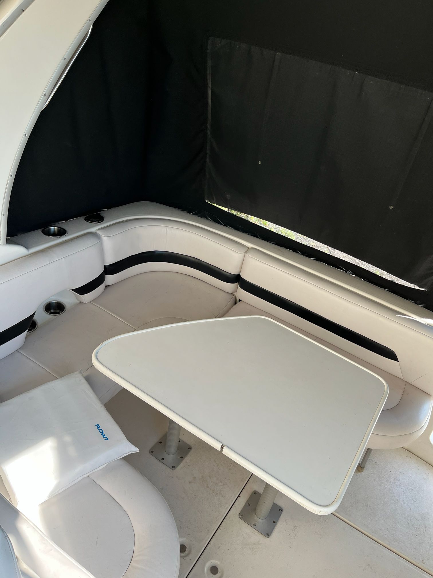 Interior of a 2000 Chaparral Signature boat with seating area.