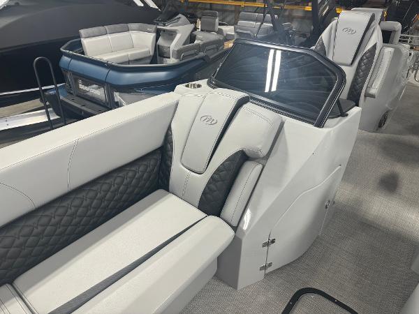 2025 Manitou LX boat interior with luxurious seating and modern design.