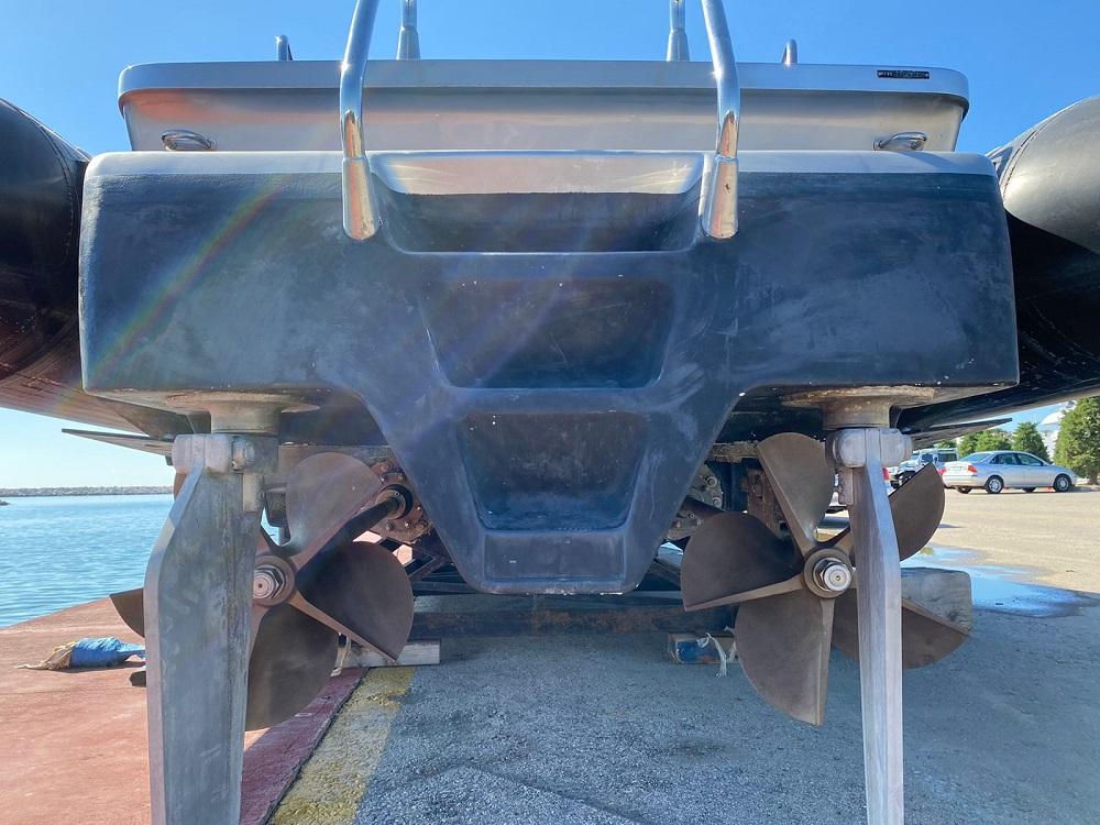Rear view of 2010 FB Design 42 SF boat with dual propellers.
