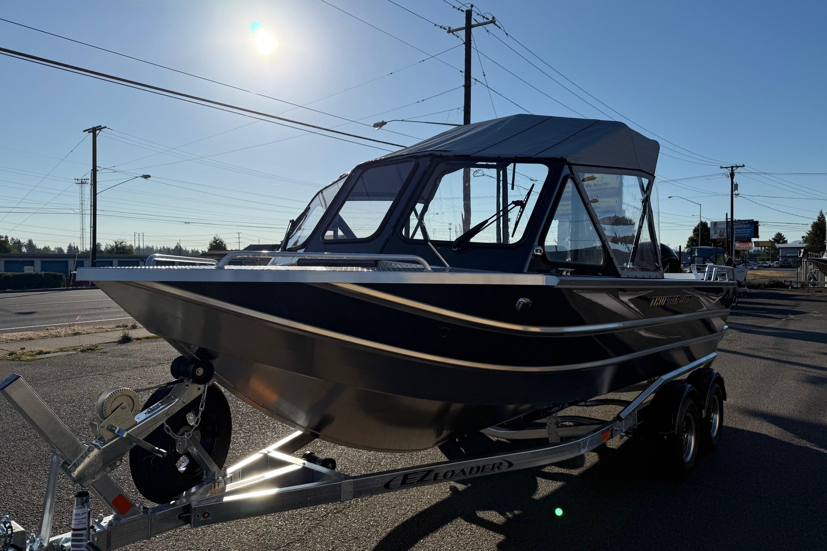 2026 Thunder Jet 200 Luxor boat on trailer under bright sun.