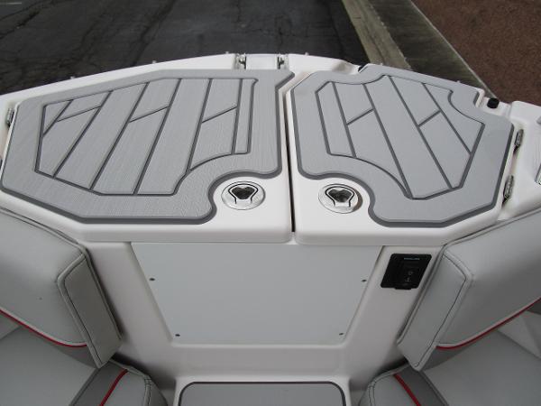 2025 Solara S-250 CW boat deck with gray cushioned seating and storage compartments.