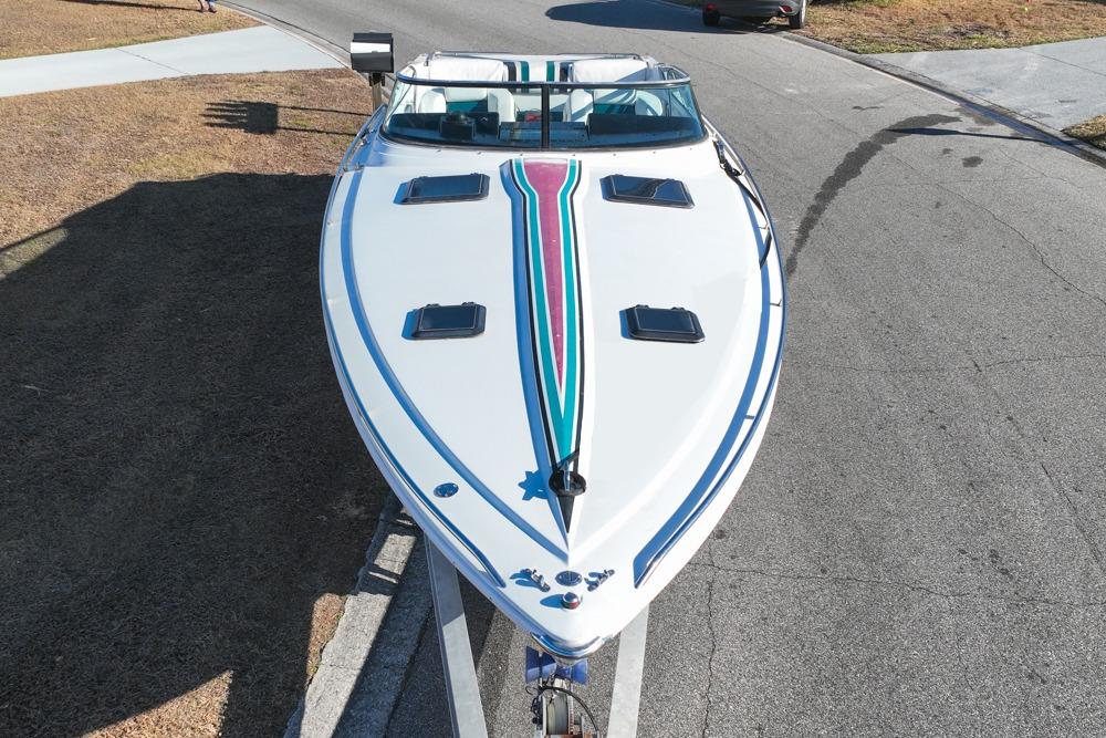 1989 Formula 292 SR-1 boat on trailer, top view, vibrant stripe design.