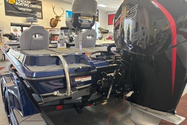 2026 Nitro Z19 XL boat with powerful engine displayed in showroom.