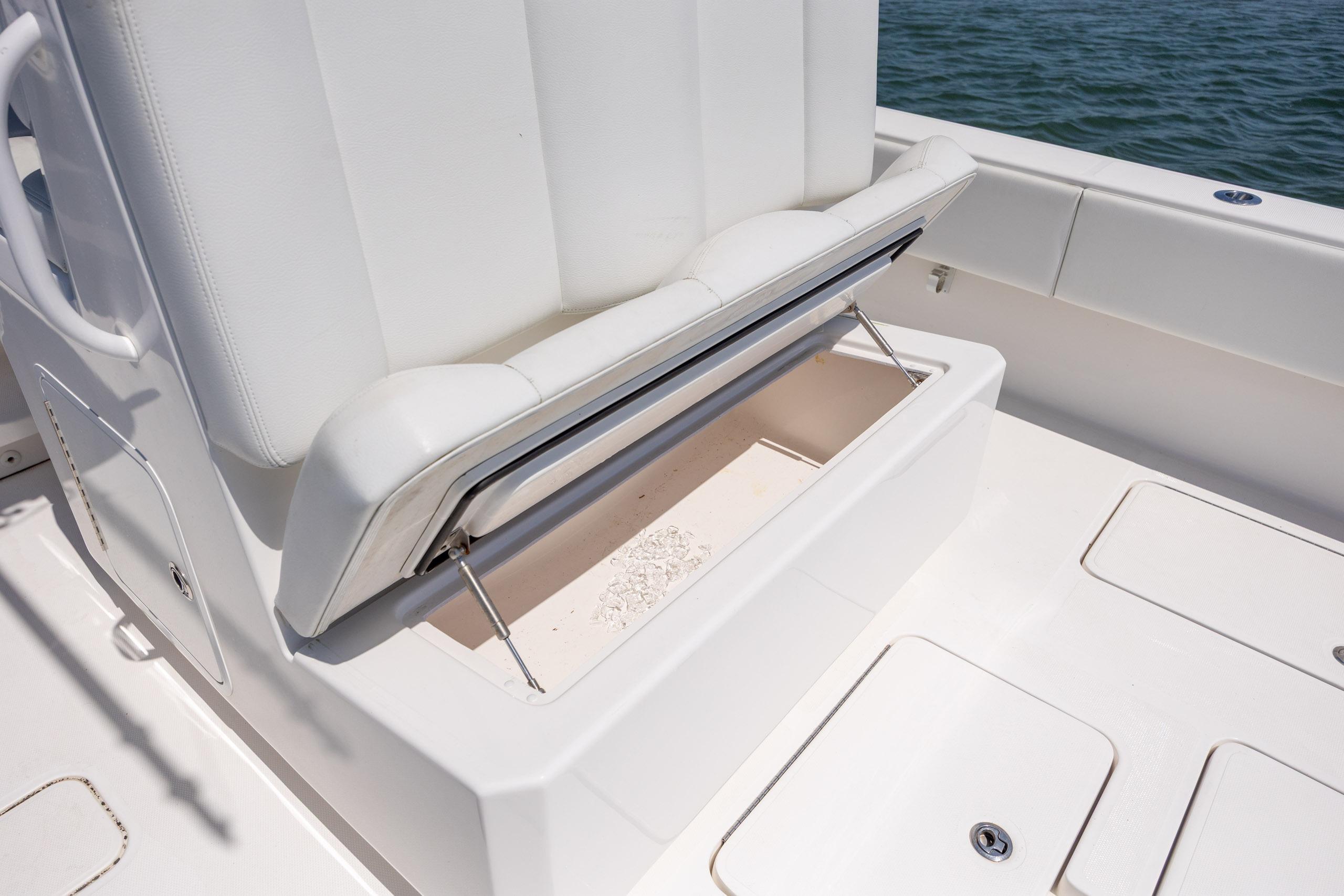 2019 Invincible 36 Open Fisherman boat with open storage compartment on deck.