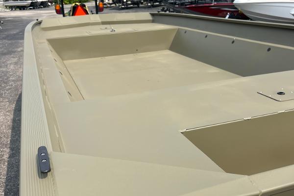 2025 Tracker GRIZZLY 2072 Utility boat, spacious deck, beige color, outdoor setting.